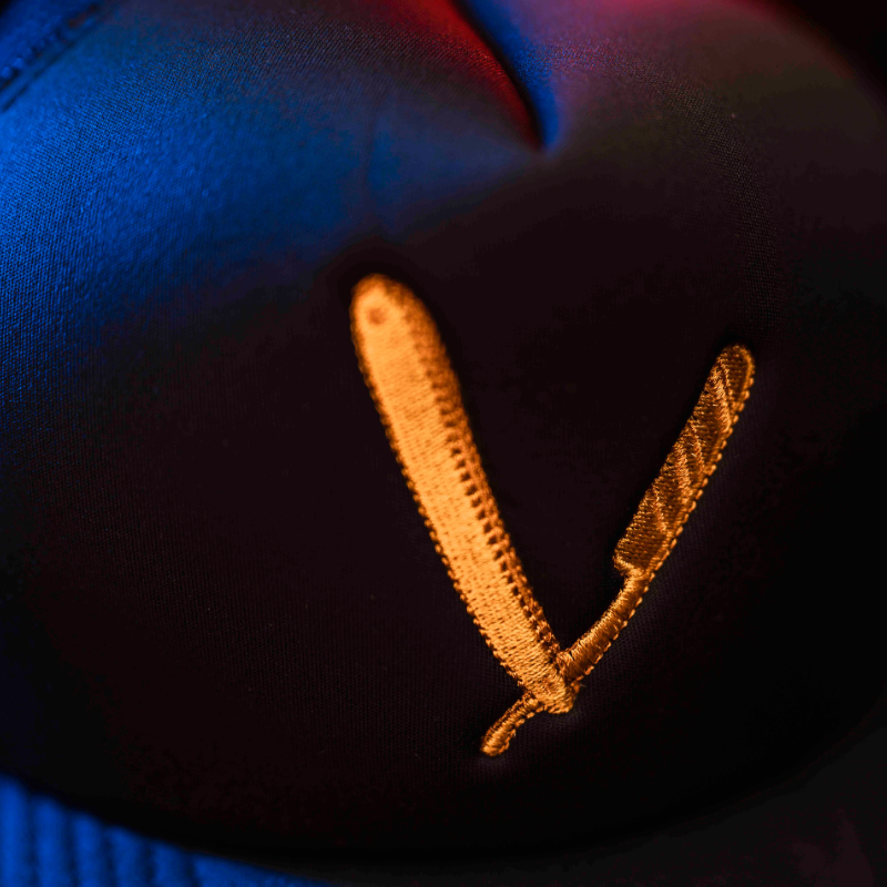Gold Razor Trucker hat
